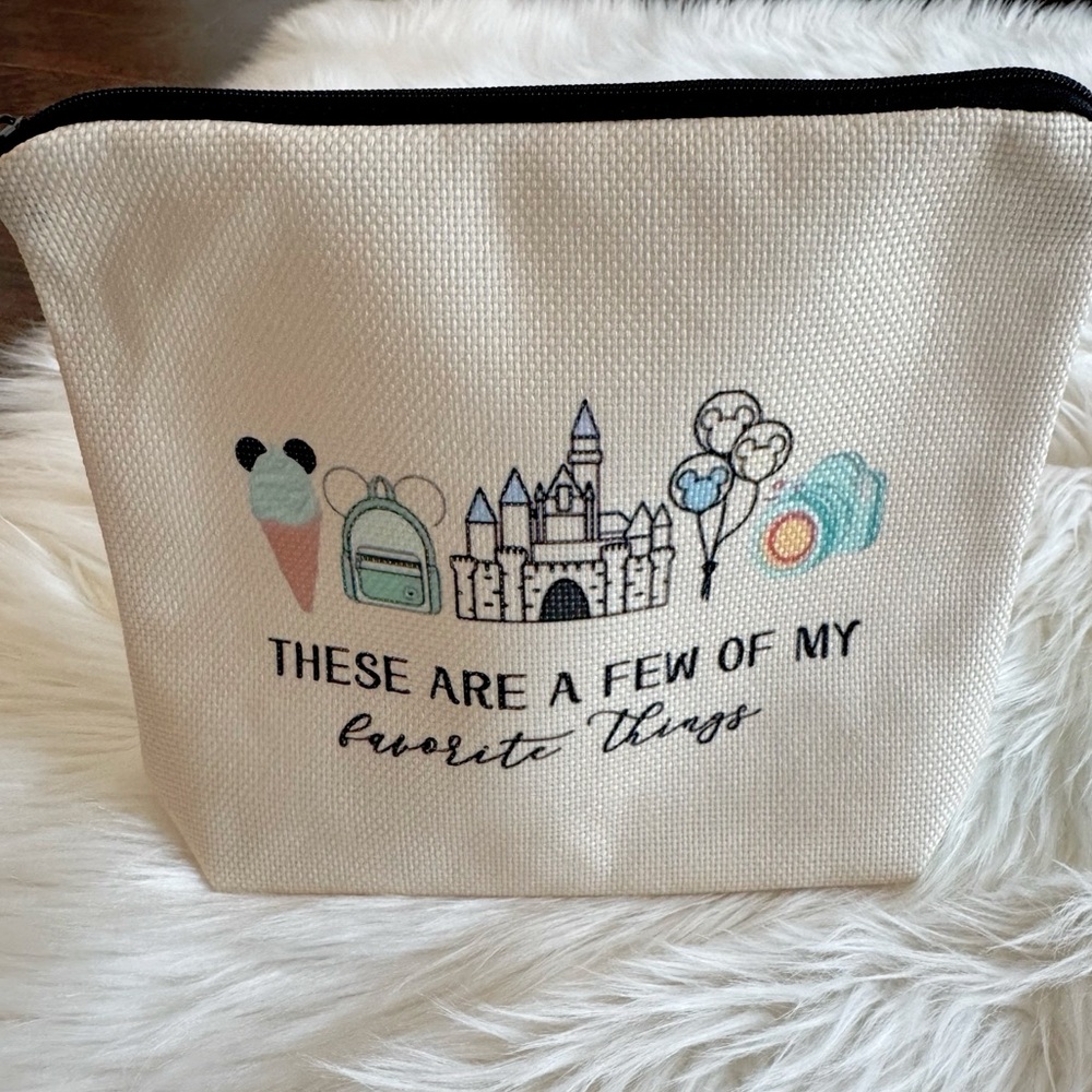 Disney Park Essentials Cream Canvas Pouch Bag with Fun Nostalgic Disney Print